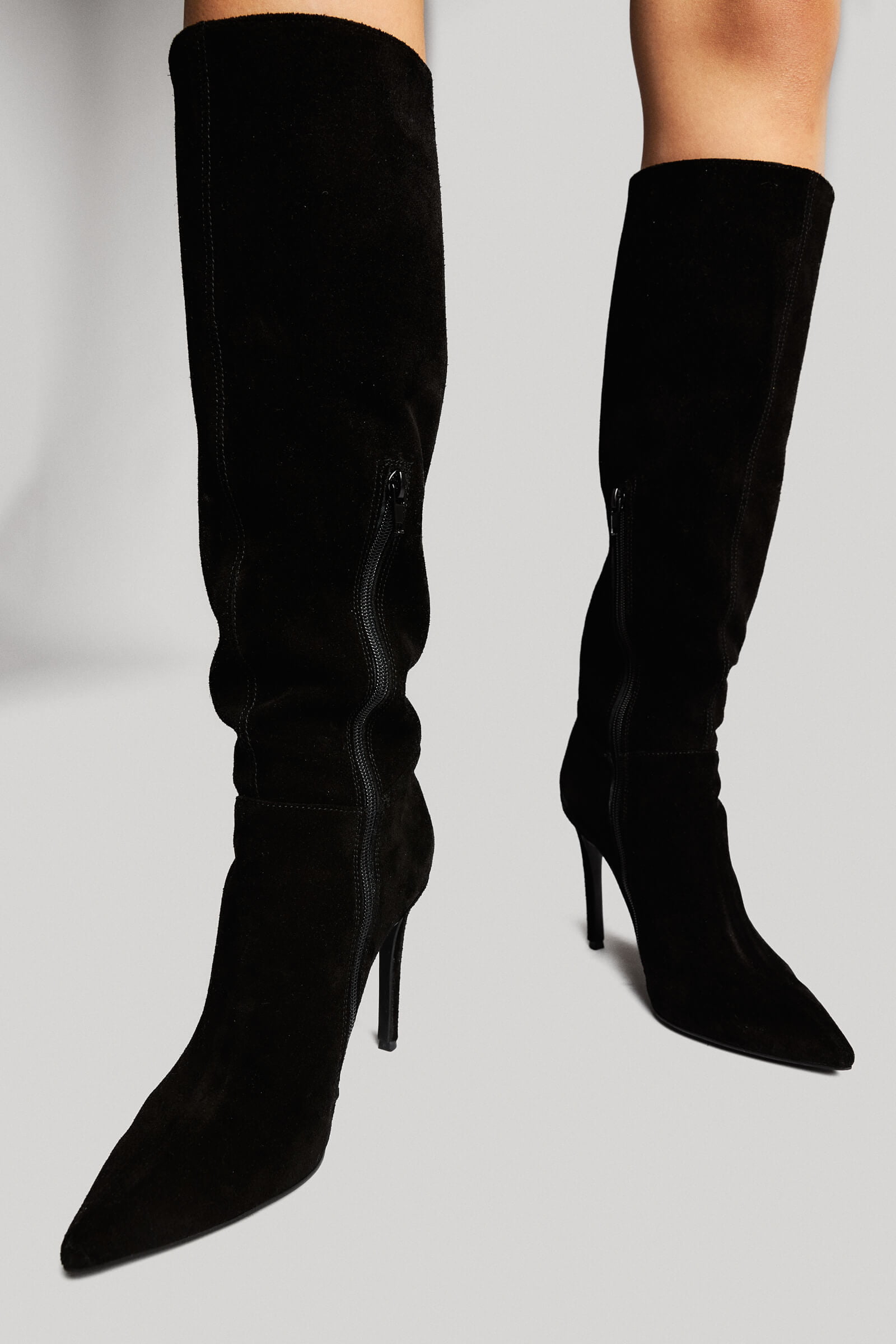 WOW! Yes, that is the word we were looking for to describe our “Splendor” Suede Stiletto Boots that sit atop high-heels in such a fashionable manner. Every step you take in these marvels, will be followed through by a shower of compliments. We’re definitely waiting for your feedback.